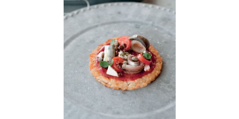 Pizza di riso con sarde di lago